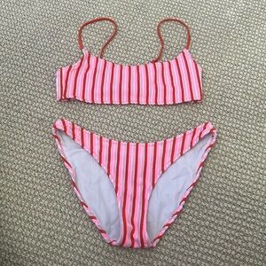 Adorable and trendy Triangl bikini in size small. Good condition!